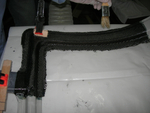 Extended carbon fiber onto hinge lug.