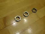 Two forward and one aft 11/16 nuts get weight reduction
